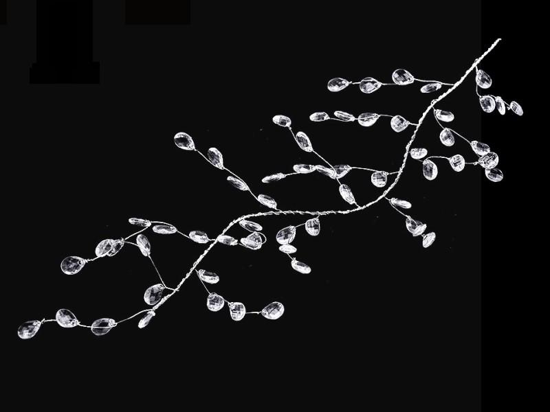 Zweig mit geschliffenen Perlen
